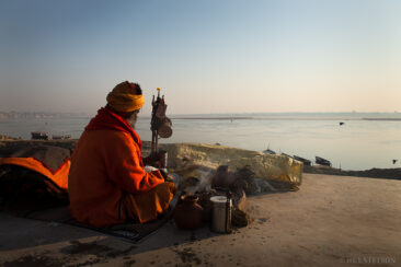 A sadhu meditating along the banks of the Ganges River.