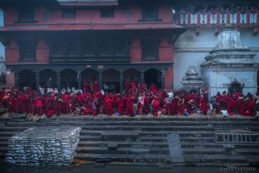 Women pilgrims preparing for their holy bath during the Swasthani Festival.