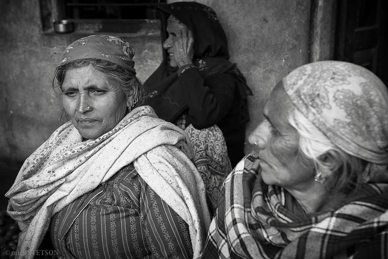 Himalaya Village Elders sitting on a porch